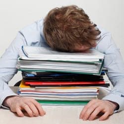 Employee asleep at his desk