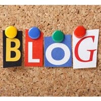 "blog" pinned up on corkboard