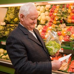 Baby boomer man, food shopping