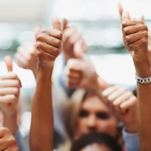 Crowd giving thumbs up