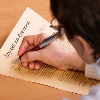 Woman signing a Will