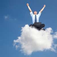 Man sitting on a cloud, celebrating