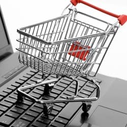 Shopping trolley on a computer keyboard