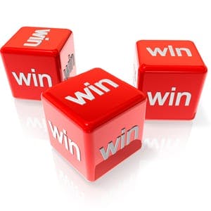 three dice saying win