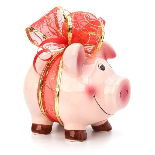 Piggy bank with bow tied around it