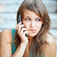 anxious woman on mobile phone