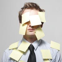Man covered in post-it notes