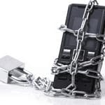 Mobile phone wrapped in chains and a padlock