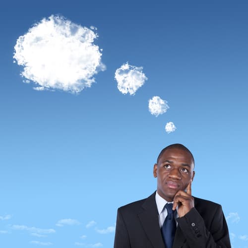 business man with clouds above his head