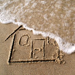Drawing of house in sand being washed away