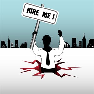 Job candidate holding 'hire-me' sign