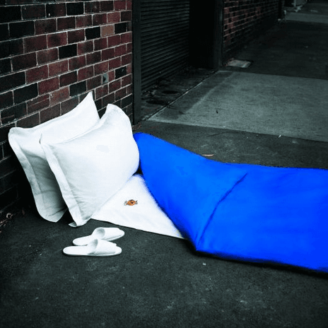 Sleeping bag with cushions, on the street
