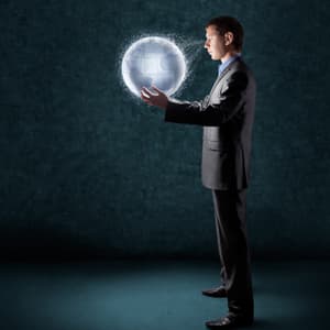 Man looking at globe of the world