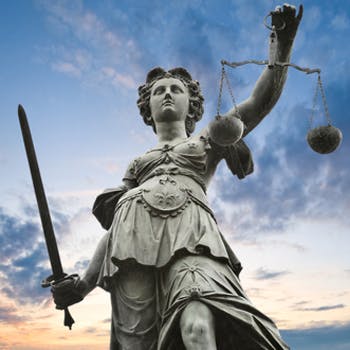 Statue of justice, holding scales