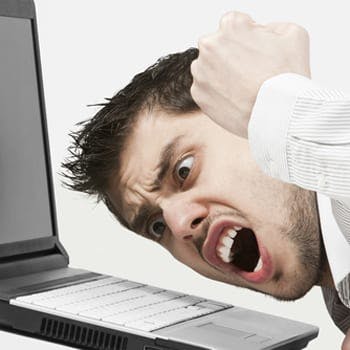 Man yelling at computer over email malfunction