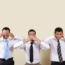 Three men, covering their eyes, ears and mouth