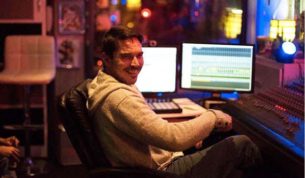Record producer making a crust and loving it